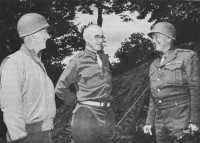Generals Hodges, Bradley, 
and Patton discuss the drive through Brittany at General Bradley’s headquarters, 17 August