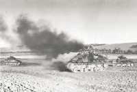 American tank damaged by 
German fire