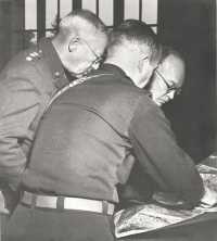 Patton confers with 
Eisenhower on plan for reduction of Fort Driant
