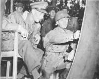 General Gavin and General 
Dempsey (on left) confer during Operation MARKET-GARDEN