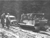 Weasel (M29 Cargo Carrier), 
similar to those used for evacuating wounded, pulls jeep out of the mud