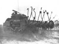 British flail tank beating 
the road to explode mines