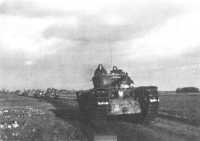 Column of British Churchill 
tanks on a road near Geilenkirchen