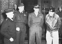 General Bradley, Air Chief 
Marshal Tedder, General Eisenhower, and Field Marshal Montgomery (left to right), during the Maastricht meeting