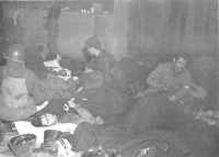 Casualties in an Improvised 
Emergency Ward during the siege of Bastogne