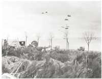 Dropping supplies by 
parachute to the 4th Division