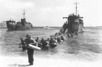 Troops of 45th Division 
wade ashore near Ste