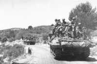 Troops and Tank Destroyers 
move through Salernes