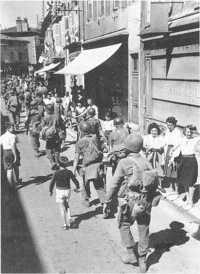 157th Infantry, 45th 
Division, passes through Bourg, September 1944