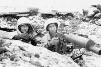 Men of the 100th Division 
maintain heavy machine-gun position, near Rimling, 1945