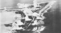 Japanese patrol craft 
lost in the assault on Wake Island are silent witnesses to an American carrier raid during the last days of the war