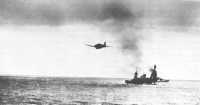 Japanese torpedo plane 
ignores two American cruisers as it heads for the crippled carrier Hornet which was sunk during the Battle of Santa 
Cruz
