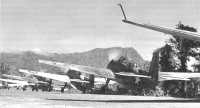 Loaded for a Rabaul 
strike, Marine TBFs roll down a taxiway toward the Piva bomber runway on 17 February 1943