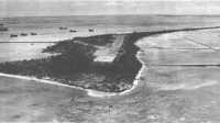 Betio Island as it 
appeared two weeks after the battle, looking west over GREEN Beach