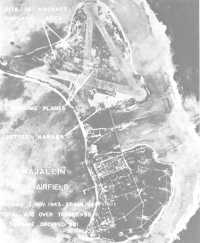 Roi-Namur, under bombing 
attack by Seventh Air Force planes, appears in an intelligence photo taken just prior to the prelanding bombardment