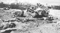 Aftermath of enemy tank 
attack on Peleliu airfield