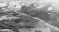 Aerial view of the 
Hagushi anchorage and Yontan airfield on L plus 2, looking southeast from Zampa Misaki