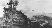 An explosion rips the 
critically damaged Franklin as crewmen run for safety
