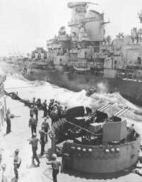 Fleet Landing Force 
personnel are transferred from USS Missouri to USS Iowa somewhere at sea off the coast of Japan prior to the initial 
occupation landings