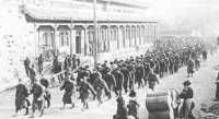 North China Marines, en 
route to prison camp in Shanghai, are paraded through the streets of Nanking by their captors on 10 January 1942