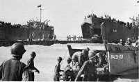 Ponton Causeway extending 
from an LST to shore was first used in invasion of Sicily