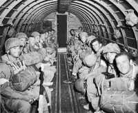 Airborne reinforcements in 
a C-47 heading for Sicily on 11 July