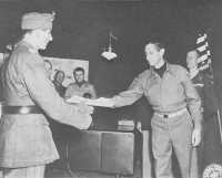 General Von Senger 
surrenders to General Clark at Fifteenth Army Group headquarters