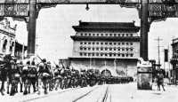 Japanese troops marching 
through the Peiping Gate, September 1937