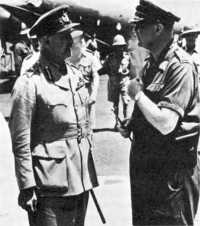 General Ter Poorten greets 
General Wavell (left) on his arrival at Batavia