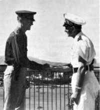 General Patch being greeted 
by Admiral d’Argenlieu