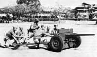 Philippine Scouts at Fort 
McKinley firing a 37-mm