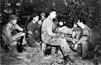 “Voice of 
Freedom” broadcasts to the men on Bataan