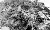 THE SOUTHEAST END OF 
TULAGI was heavily defended by the enemy dug into the steep hillsides and ravines