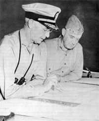 Admiral Turner and General 
Vandegrift photographed during a conference on Guadalcanal plans