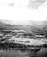 The ravine in front of 
Hills 80–81, where the 164th Infantry attacks stalled on 23 November, was well defended by Japanese dug into 
defiladed positions in Hills 83 and 82