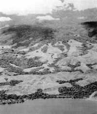 The Mount Austen battle 
area viewed from the coast just east of the Matanikau River (lower right)