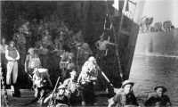Australian troops debarking 
from LSTs for the occupation of Lae