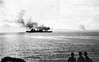 Early morning bombardment 
of landing beaches east of Cape Gloucester, 26 December 1943