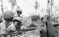 Marines prepare to attack a 
Japanese defensive position