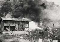 Flame thrower blasting 
Paradise Valley cave, an effective method of flushing Japanese