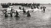 4th Marines wading toward 
WHITE Beach 1 keep their weapons dry