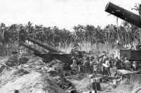 8-inch howitzers readied 
for action against an enemy strong point southwest of Tacloban