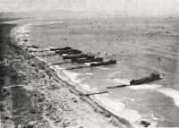 LSTs with causeways at XIV 
Corps Beach