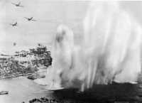 This low-level bombing 
attack on L minus hit enemy shipping in the mouth of the Bishi River
