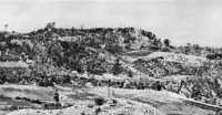 Tanabaru Escarpment 
viewed from position of the 17th Infantry, 7th Division, on a finger of Hill 178