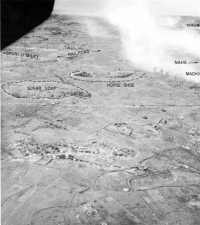 Sugar Loaf and Horseshoe 
Hills, photographed after the battle had moved on into Machisi and almost to Naha