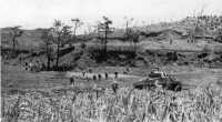Dakeshi Ridge was 
attacked by these tank-infantry teams of the 7th Marines, 1st Division, in attempting to reach the eastern slope