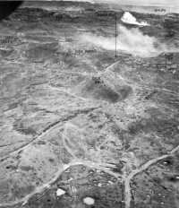 Dick Hills and Flattop, 
photographed 23 May 1945, two days after reduction of these positions