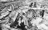 These Japanese howitzers 
were caught on the road leading south from Shuri