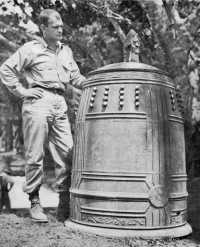 The Shuri Castle bell, with 
an American officer standing by